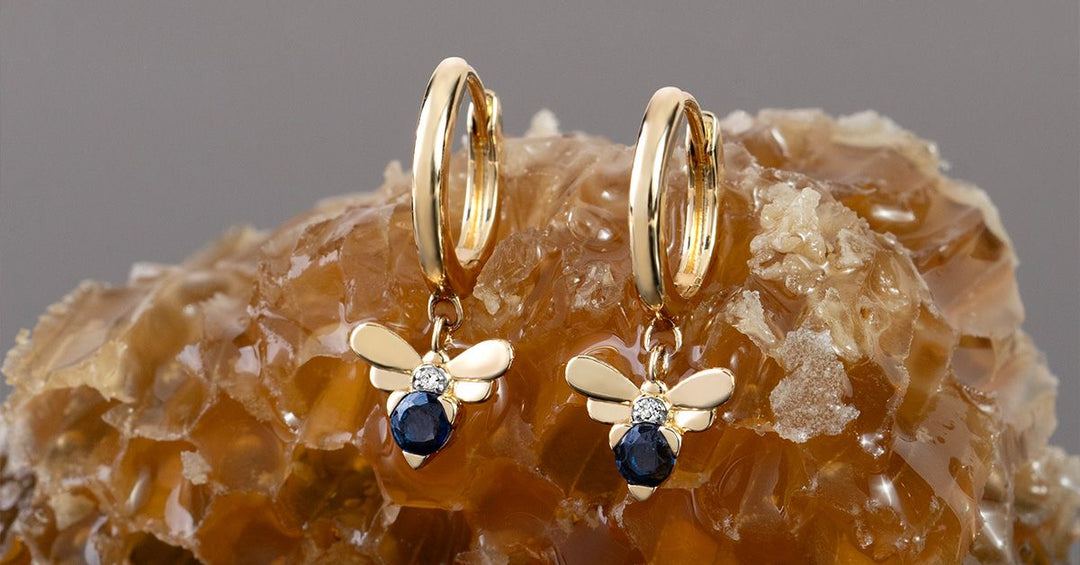 How do you clean sapphire earrings and their backs safely?