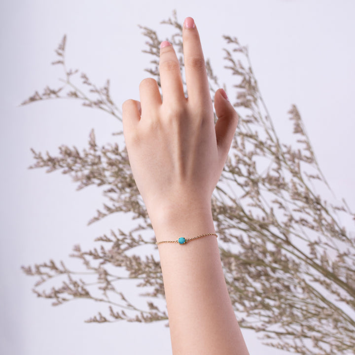 Klassisches Schachbrett-Armband mit rundem Saphir in 9 Karat Gelbgold