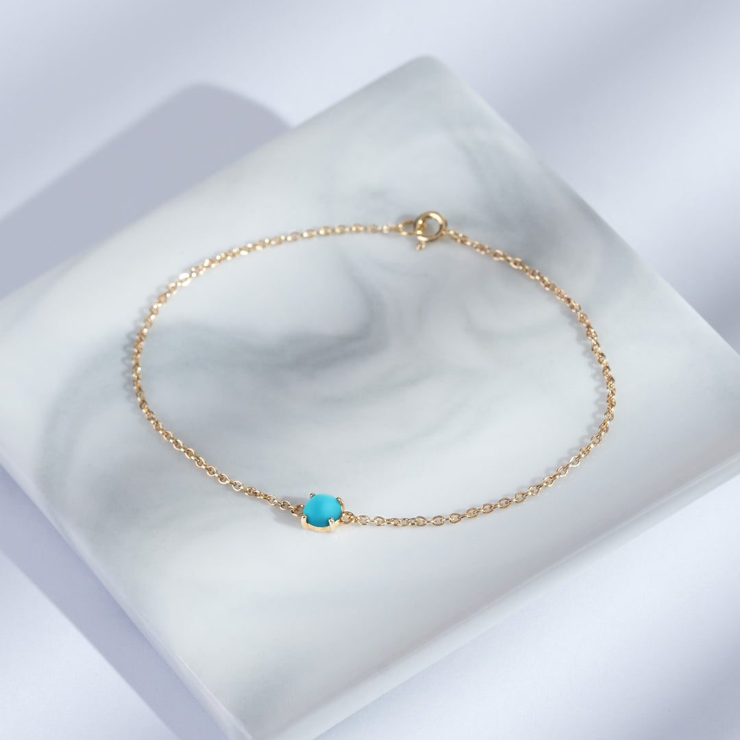 Klassisches Schachbrett-Armband mit rundem Saphir in 9 Karat Gelbgold