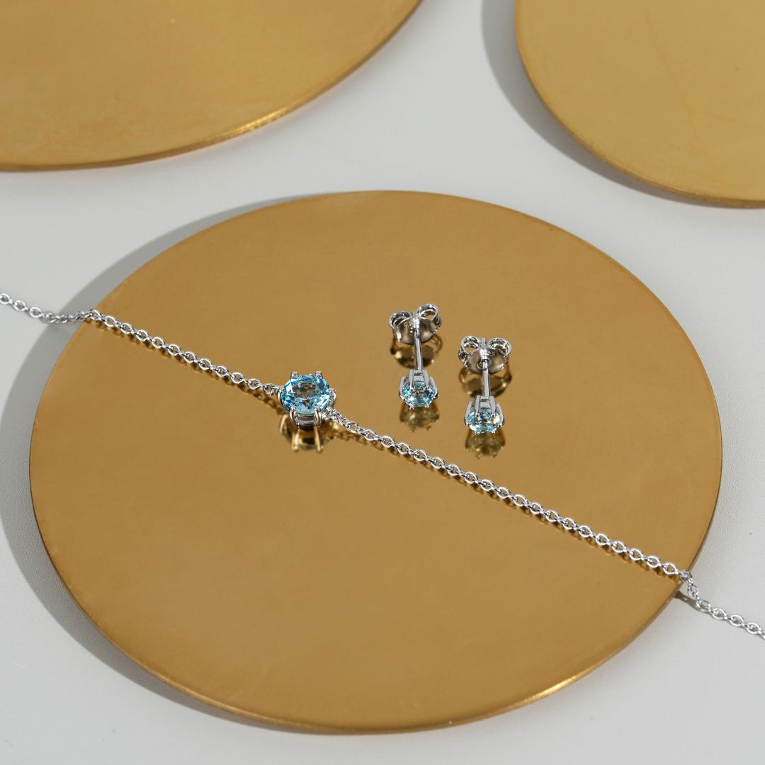 Klassische runde blaue Topas-Ohrstecker und Armband aus 925er Sterlingsilber