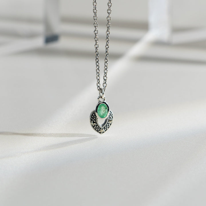 Art Deco Style Oval Emerald & Marcasite Necklace in 925 Sterling Silver flatlay