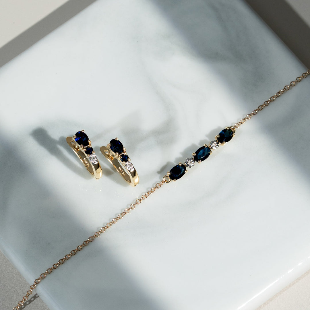 Klassische ovale Creolen mit Saphir und Diamanten in 9 Karat Gelbgold