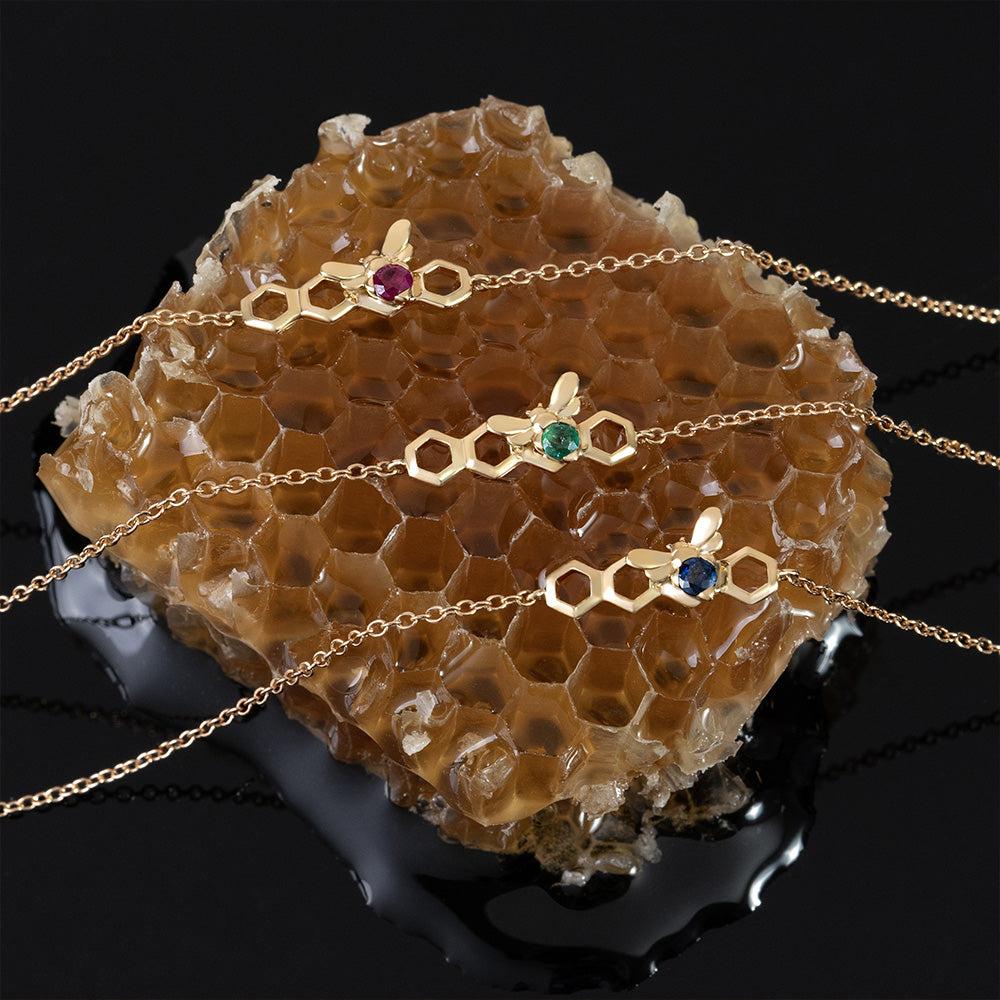 Von Bienenwaben inspiriertes Rubin-Gliederarmband aus 9-karätigem Gelbgold