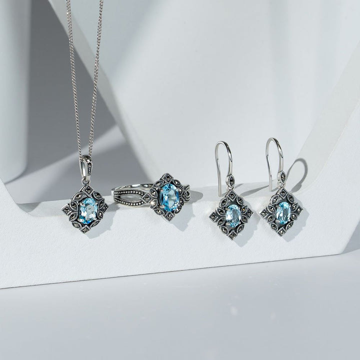 Ovale Tropfenohrringe im Art-Deco-Stil mit blauem Topas und Markasit aus Sterlingsilber