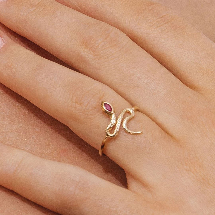132R8457029 ECFEW™ Ruby Winding Snake Ring in 9ct Yellow Gold On Model