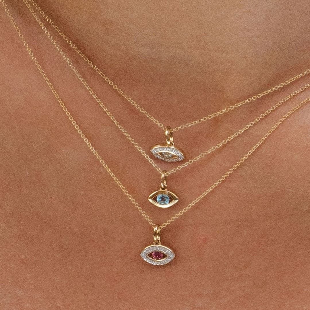 ECFEW™ Dainty Evil Eye Blue Topaz Pendant in 9ct Yellow Gold - Gemondo