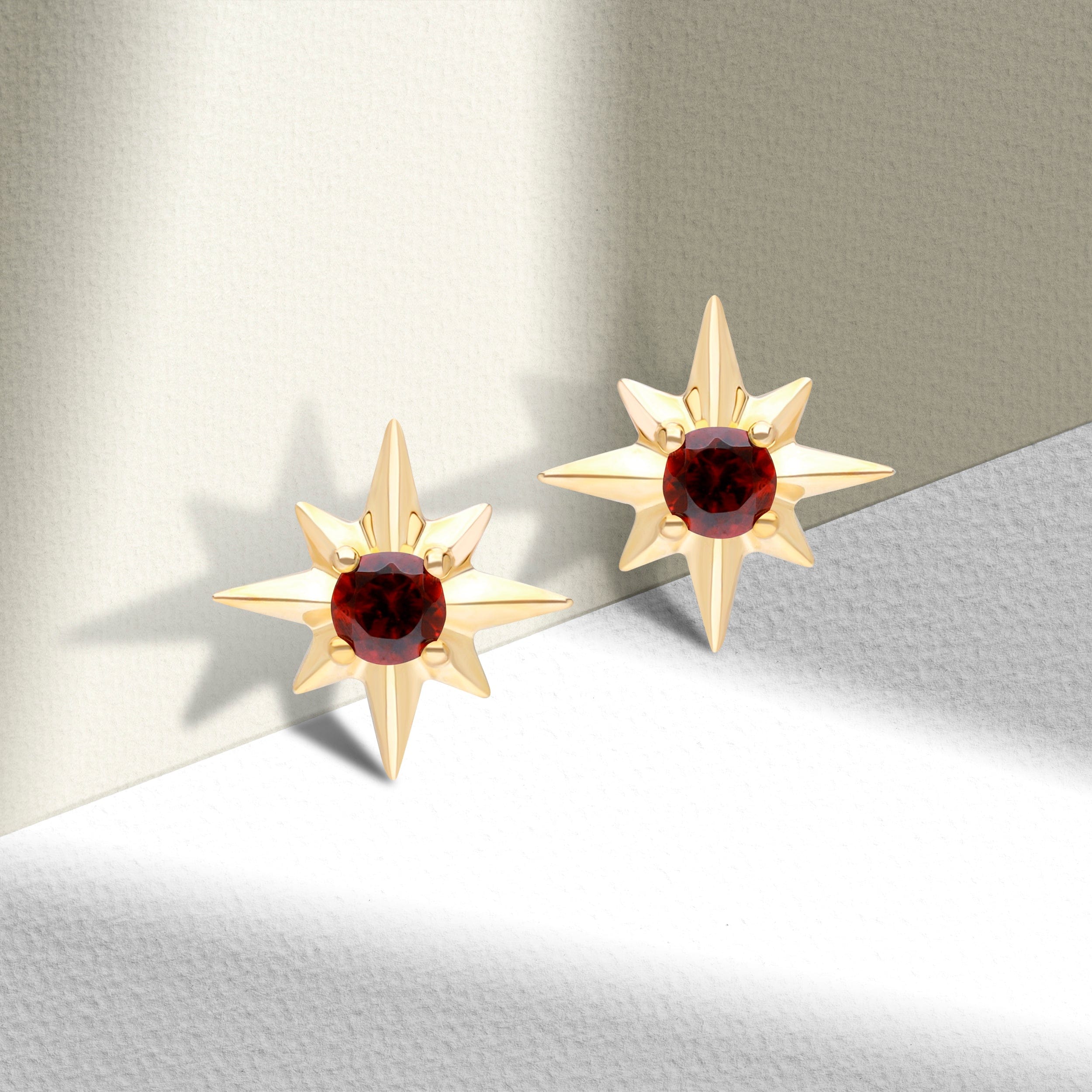 135E1821059 Night Sky Garnet Star Stud Earrings in 9ct Yellow Gold On Model